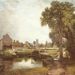 A pond in front of a house